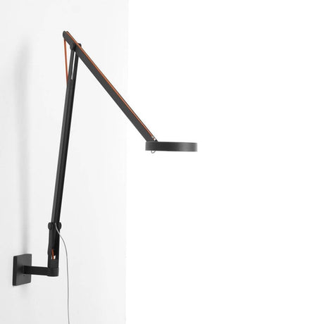Rotaliana String LED wall light with dimmer, black, mounted on a wall, modern design with flexible arm structure.