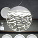 Lodes Kelly Sphere Hängeleuchte mit modernem Design, Lichtspiel und eleganten Laserschnitten.