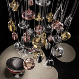 Lodes Nostalgia Glas Pendelleuchte mit elegantem Retro-Design in verschiedenen geschwungenen Formen und Farben.