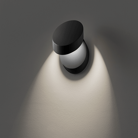 Lodes Pin-Up LED adjustable wall lamp with a clear, organic design and flexible light source.