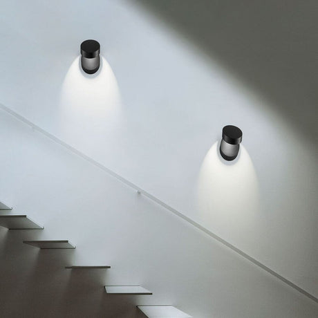 Lodes Pin-Up LED adjustable wall lamp on a staircase, featuring a modern, clean design style.