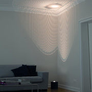 Tecnolumen Egyptian Eye Bodenlampe Marmor mit Effekt Schwarz projiziert beeindruckendes Lichtmuster an Wand.