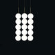 Terzani Abacus LED Design-Hängelampe 3er mit modularen, weißen Leuchtenkugeln an elegantem Design.