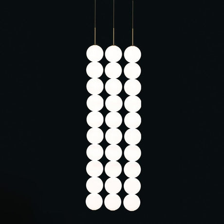 Terzani Abacus LED Design-Hängelampe 3er mit modernen, runden Leuchtelementen in elegantem Design.