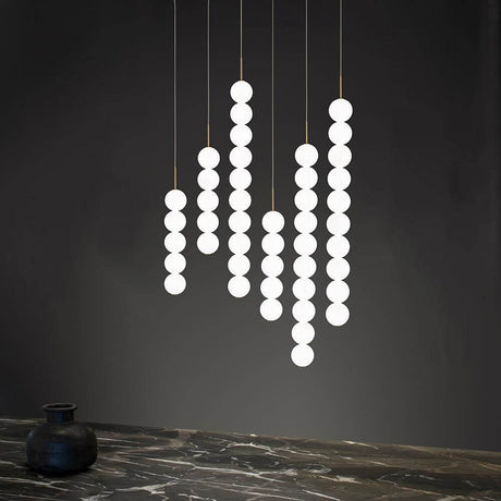 Terzani Abacus XXL LED designpendelampe i elegant, funksjonelt design, ideell for moderne interiører.