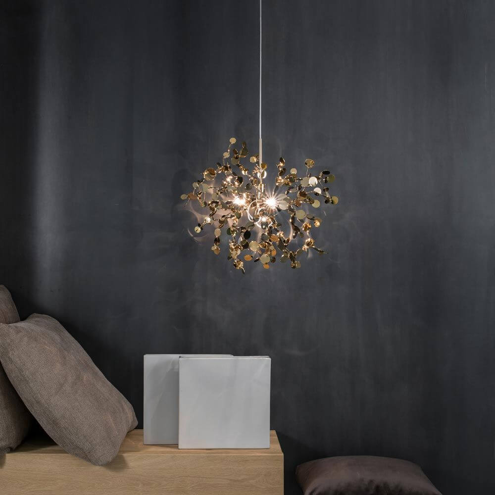 Terzani Argent Design-Pendelleuchte Ø 40cm in einem modernen Wohnzimmer mit eleganter Beleuchtung.