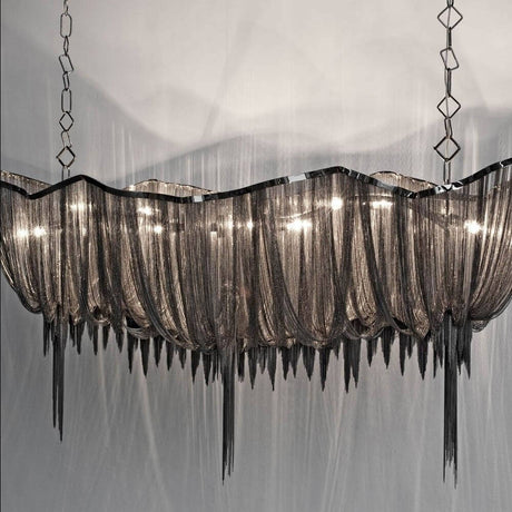 Terzani Atlantis Designer-Hängelampe in elegantem Design mit schimmernden Stoffelementen.