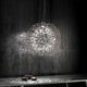 Terzani Core Design-Pendellampe Ø 70cm in modernem Ambiente mit lebendigem Lichtspiel.