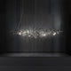 Elegante Terzani Doodle Design-Esstischlampe 135cm in der Luft mit dynamischen Formen und weichem Licht.