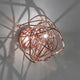 Terzani Doodle Wandlampe mit einzigartigem Design und handgefertigten Elementen, die dynamische Lichtmuster erzeugen.