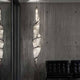 Terzani Epoque LED Design-Hängelampe Ø 35cm in modernem Raum mit elegantem Design und reflektierenden Oberflächen.