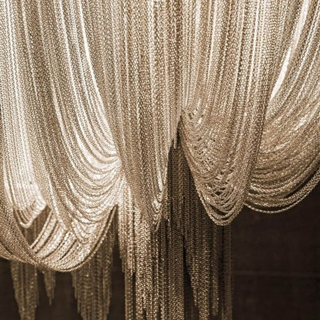Terzani Epoque LED Design hængelampe Ø 35cm med elegant kædedesign og lette skulpturelementer.