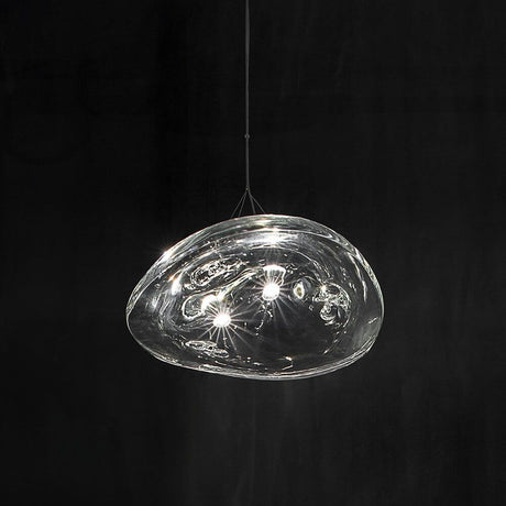 Terzani Manta LED Design-Pendelleuchte aus Kristall mit geschwungenen Linien und weichem Licht.