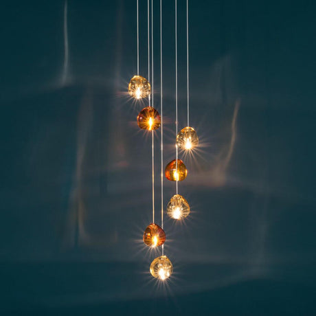 Terzani Mizu Design Hängeleuchte 7-flammig Ø 31cm mit einzigartigen Kristallformen und sanftem Licht.
