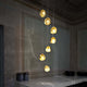 Terzani Mizu Design Hängeleuchte 7-flammig Ø 31cm in stilvollem Interieur mit beeindruckenden Lichtbrechungen.