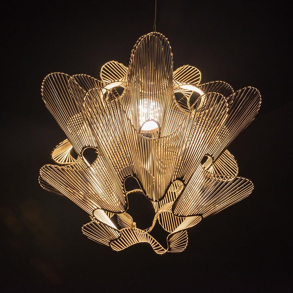 Terzani Moiré Design Kronleuchter Ø 65cm mit wellenförmigem Muster und warmem Licht.