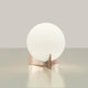 Terzani Oscar Design-Tischlampe mit weißem Glas und eleganter Metallbasis auf einem Tisch