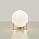 Terzani Oscar Design-Tischlampe mit rundem, weißem Lampenschirm und glänzendem, roségoldenem Sockel.