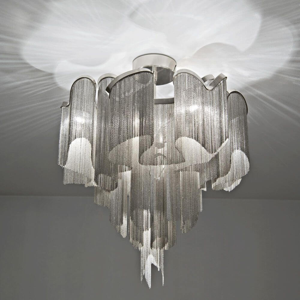 Terzani Stream Design-Deckenlampe mit einzigartigem Wellenmuster aus Metallketten, ideal für stilvolle Innenräume.