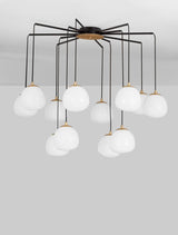 Pendelleuchte THE EGG mit 12 opalen Glasschirmen in Gold, Schwarz und Weiß, modernes Design, elegante Raumbeleuchtung.