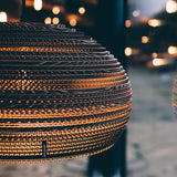 Jazzy hanging lamp made of cardboard oval