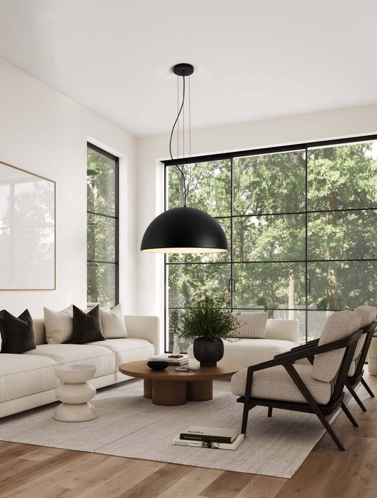 Tholos Pendelleuchte E27 3-flammig in Schwarz und Weiß, modern und stilvoll im Wohnraum installiert.