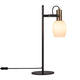 Tischlampe Arild mit rundem Opalglasschirm und bräunlichen Messingdetails im modernen Design.