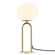 Table lamp Shapes with an opal glass shade and a glossy brass base for an elegant design.