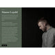 Simon Legald, Designer, Portraitaufnahme auf dunklem Hintergrund, charakteristischer Look und Stil.
