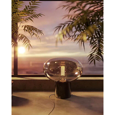 Moonstone Marble table lamp Ø 45cm with amber glass and black marble base in retro style.