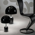 Tom Dixon Bell Tischleuchte mit Drehdimmer in Schwarz, mit polierter Oberfläche und modernem Design.