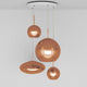 Tom Dixon Copper Round 4er Mobile Ø 95cm mit hochreflektierender Oberfläche und warmem Schimmer.