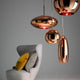 Tom Dixon Copper Pendelleuchte im modernen Design, glänzender Schirm, erhältlich in verschiedenen Größen.