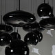 Hängelampen in schwarz, verschiedene Formen und Größen, modern und stilvoll, ideal für die Inneneinrichtung.