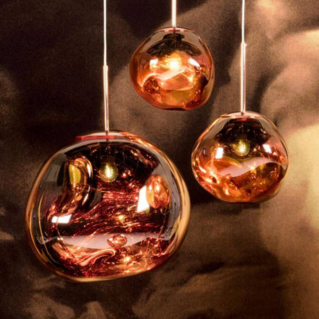 Tom Dixon Melt LED Trio Pendelleuchte 3er Mobile Ø 81cm in Kupfer mit hypnotischem Lichteffekt.