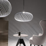 Tom Dixon Spring LED Hängelampe aus Edelstahl mit flexibler Form, dimmbar für modernes Interior.