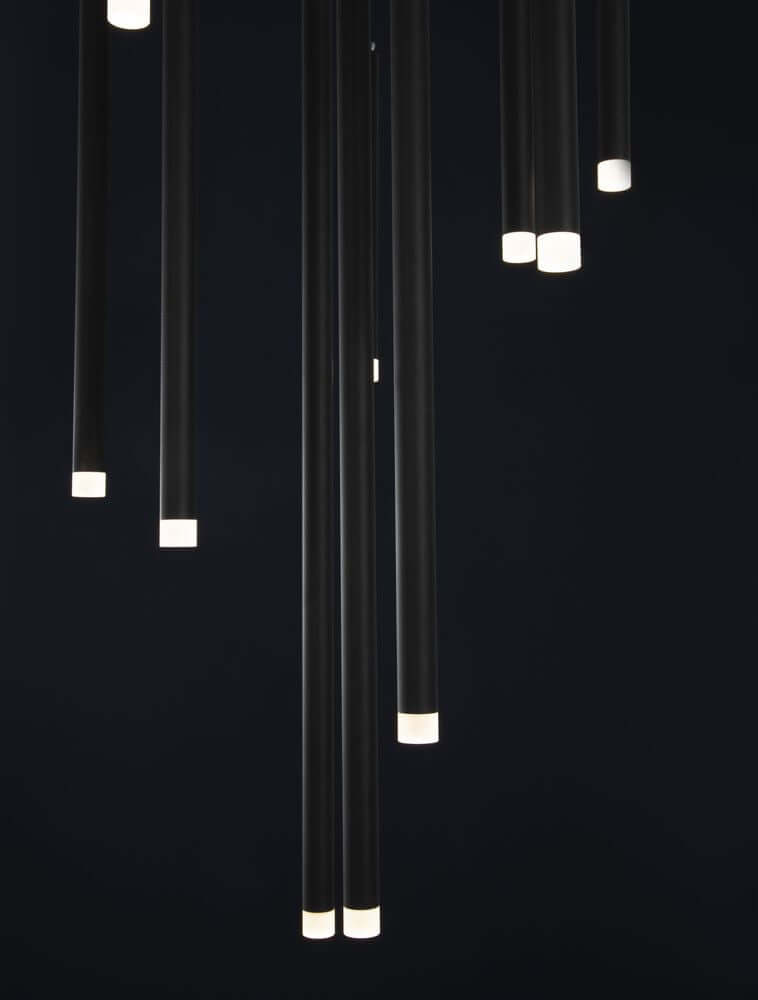 Trimle LED Pendelleuchte in Schwarz mit zylindrischen Elementen, minimalistisches Design für elegante Raumatmosphäre.