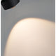 U-Rail LED Schienenspot Aldan Einzelspot Dimmbar Schwarz-Matt, Chrom strahlt warmes Licht auf eine Wand.