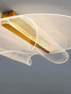 Valentin LED Deckenleuchte 3000K Gold in modernem Design mit goldener Holzleiste und dekorativem Lampenschirm.