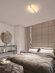 Valentin LED ceiling light 3000K Gold in a modern bedroom with stylish interior