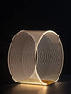 Valentin LED Tischleuchte Ø 28cm 3000K Gold auf einem dunklen Hintergrund in modernem Design.