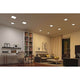 Modernes Wohnzimmer mit VariFit LED Einbaupaneelen, blendfreies Licht und stilvolles Interieur.