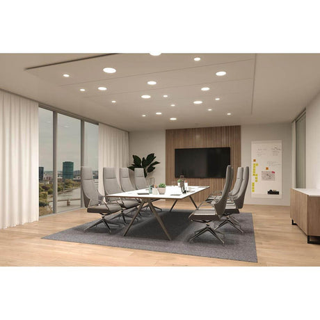 Modern conference room with VariFit Veluna LED recessed ceiling panel Ø 20 cm dimmable and stylish furniture.