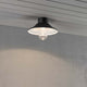 Vega LED Deckenleuchte 700lm 3000K Schwarz, klares Glas an Decke montiert.