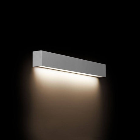 Wall S edle LED mirror light silver on a black background, elegant design and lighting effect.