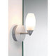 Wandleuchte Carina WL IP44 max. 28W G9 Satin Glas an einer Wand montiert, ideal für Badezimmer