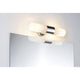 Wandleuchte Lenia IP44 max. 2x40W E14 Chrom Opak Glas über einem Spiegel im Badezimmer.