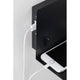 Wandleuchte Devara USB Schwarz mit integriertem USB-Anschluss und Smartphone auf der Ablage.