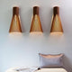 Wandleuchte Secto Small 4231 aus Holz 45cm, dreifach an der Wand montiert, aus einheimischem Birkenholz.