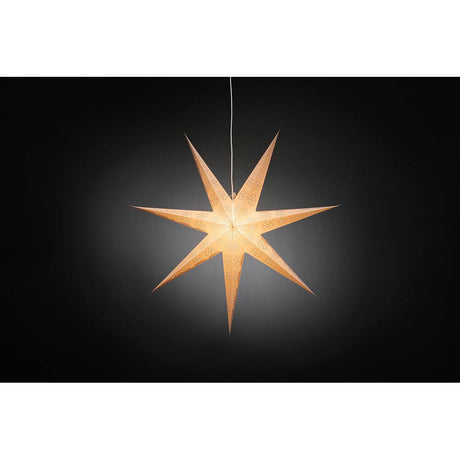 White paper star perforated with red printed pattern, 7 points, without light source, hanging against a black background.